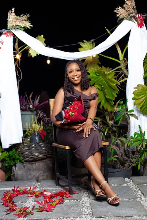 Shantel holding her roses on the night of the proposal